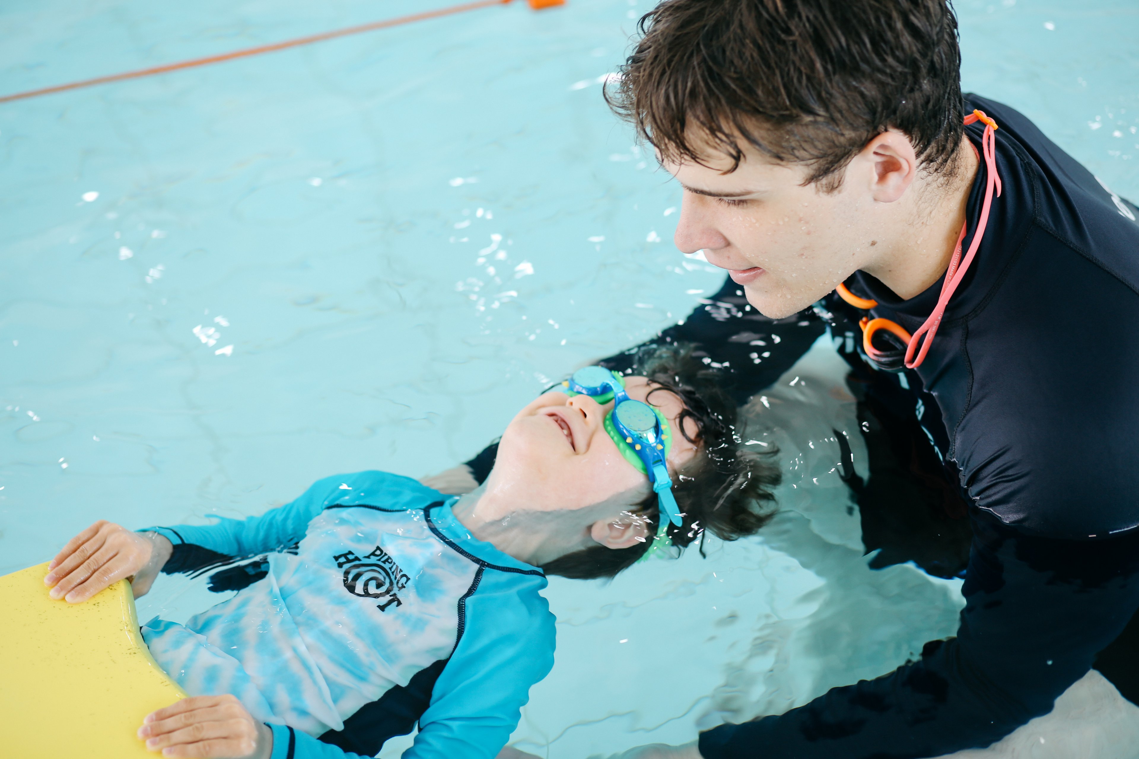 Learn to swim instructor teaching student at Ian Thorpe Aquatic Centre