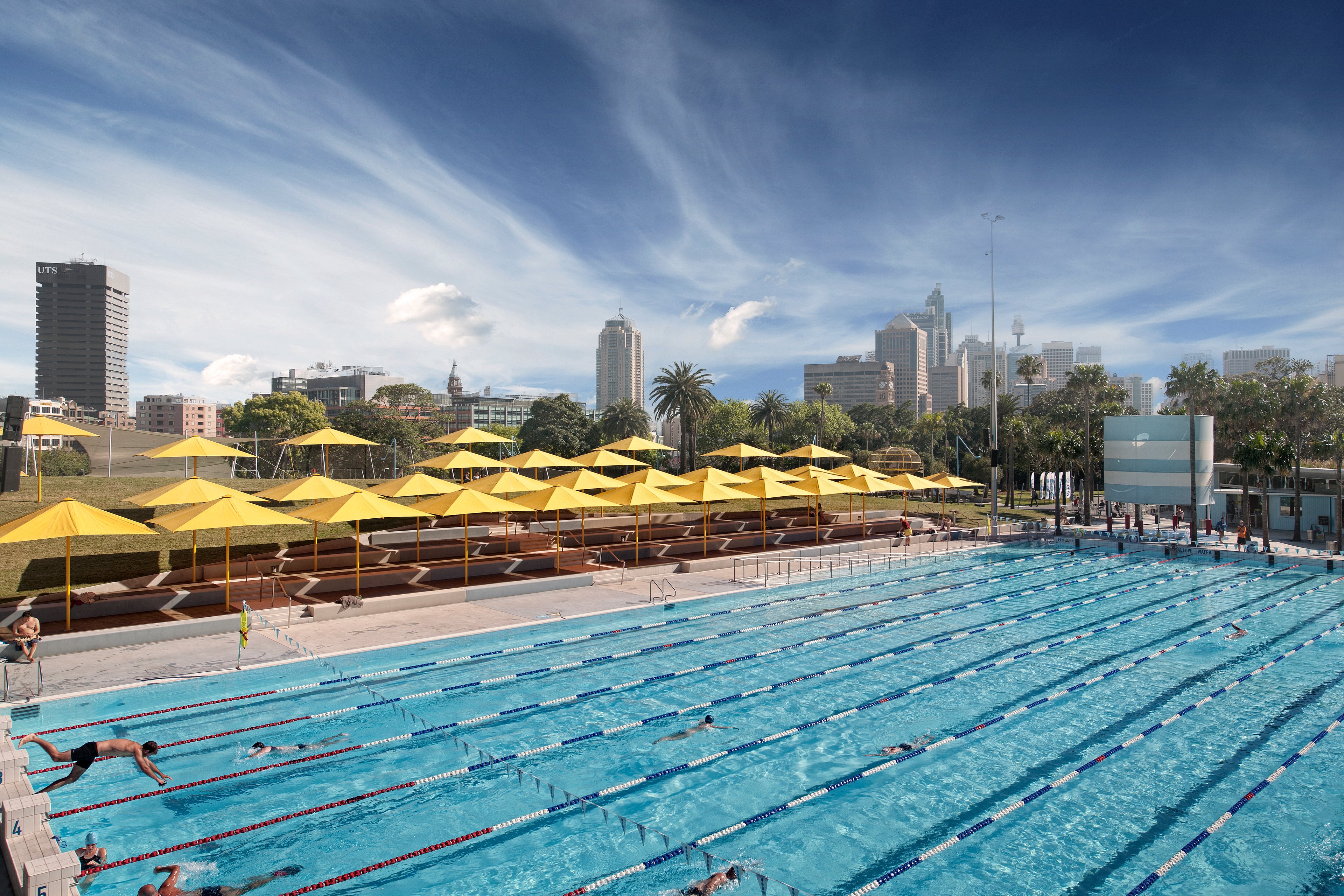 Prince Alfred Park Pool, located in Surry Hills. The Sydney skyline can be seen in the background.