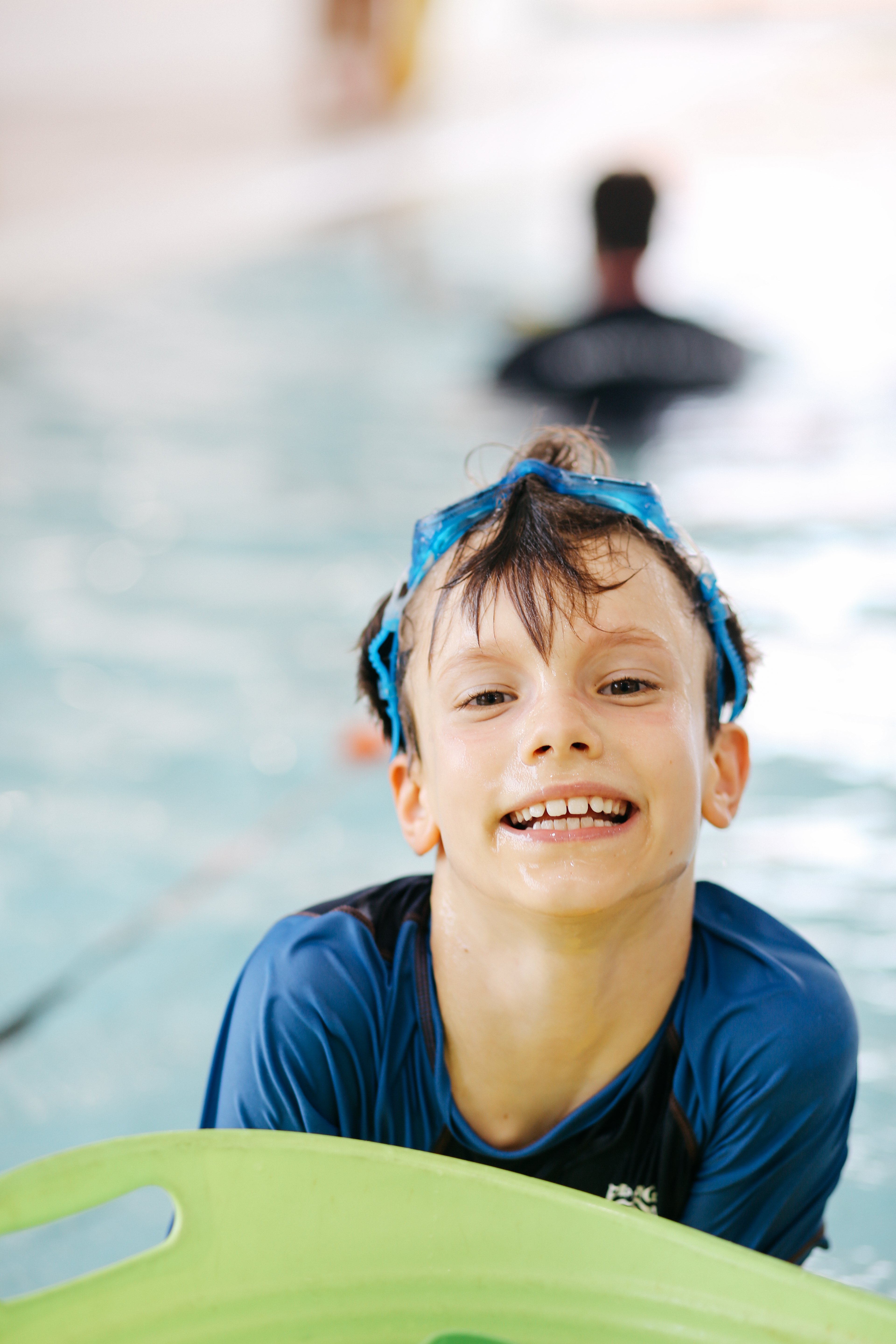 Young boy smiling during Learn to Swim lesson at Ian Thorpe Aquatic Centre