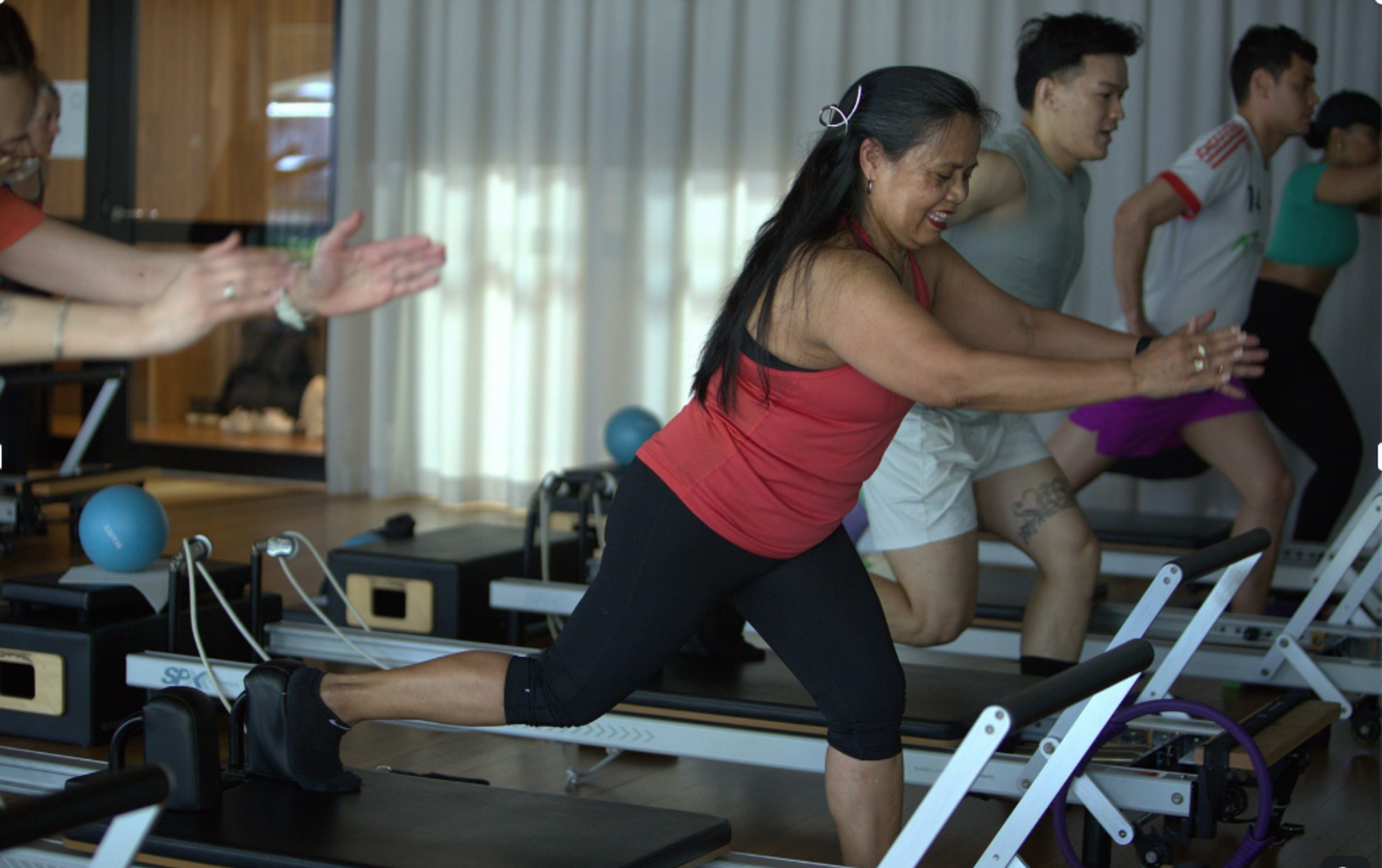 Fitness instructor Wendy during a group exercise class 