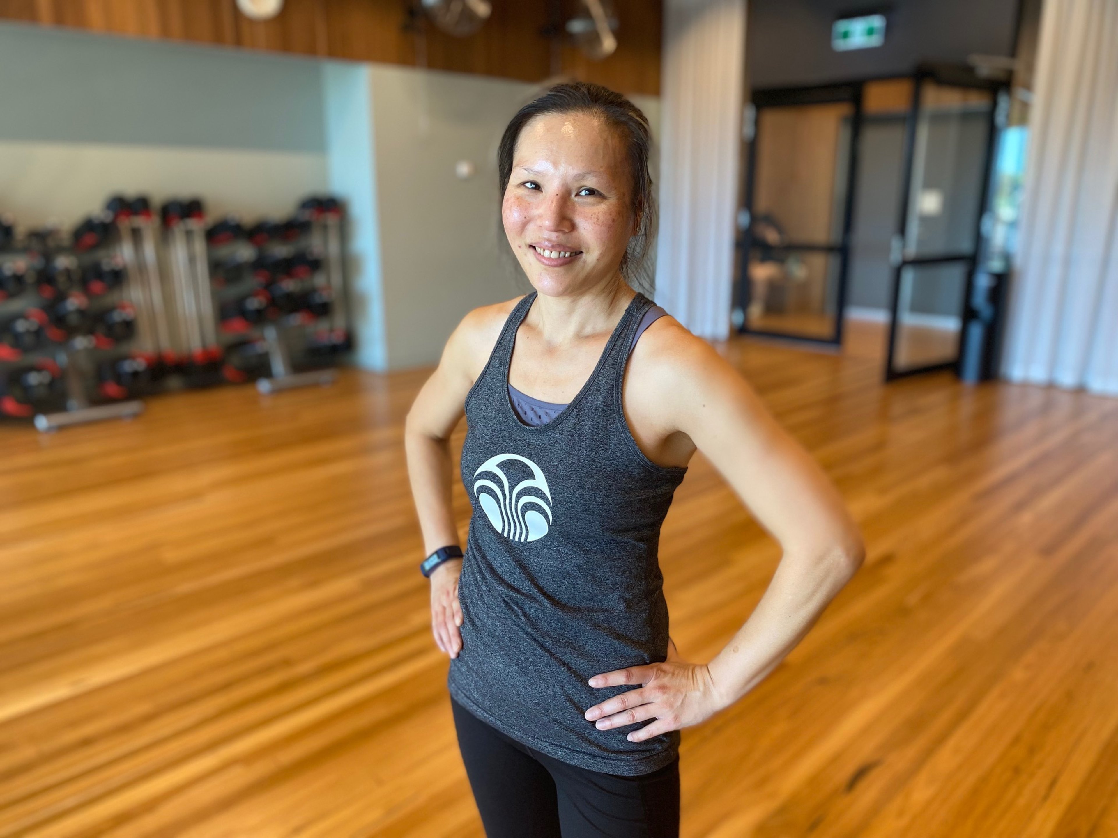 360 member Louisa smiling in the fitness studio at Gunyama Park Aquatic and Recreation Centre