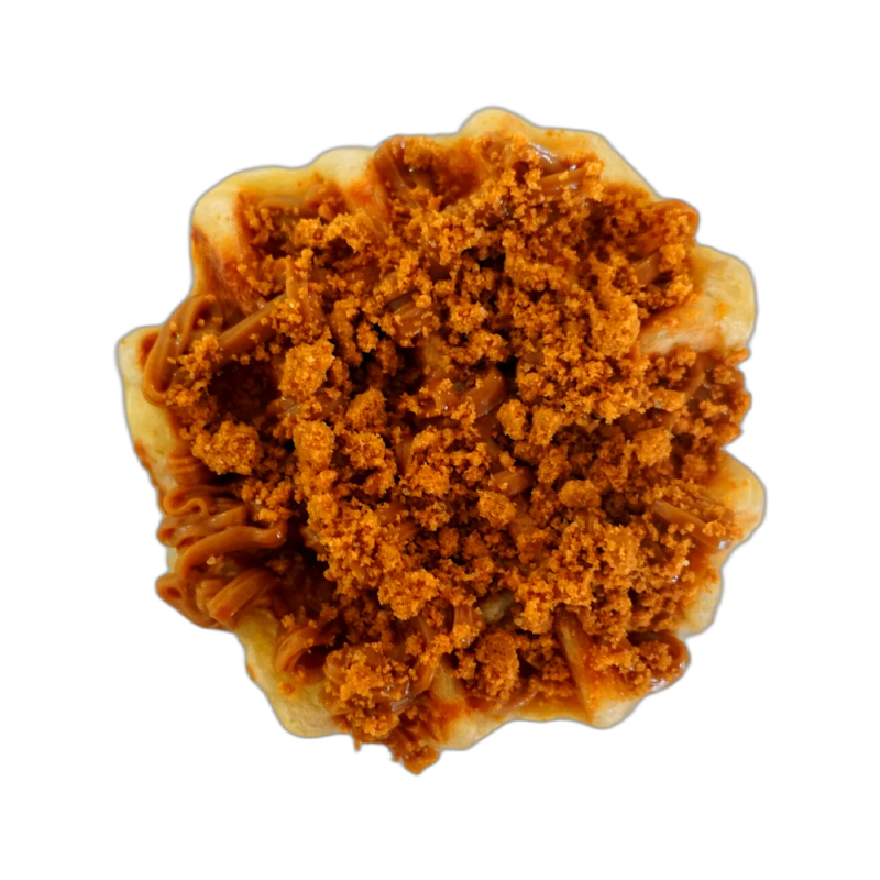 Biscoff Dream waffle topped with warm cookie-butter sauce and speculoos crumb