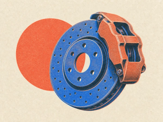 A printed cross-drilled brake disc with a caliper clamped over its edge