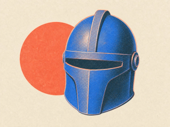 A printed full-face prop helmet with a narrow visor slot and a raised crest