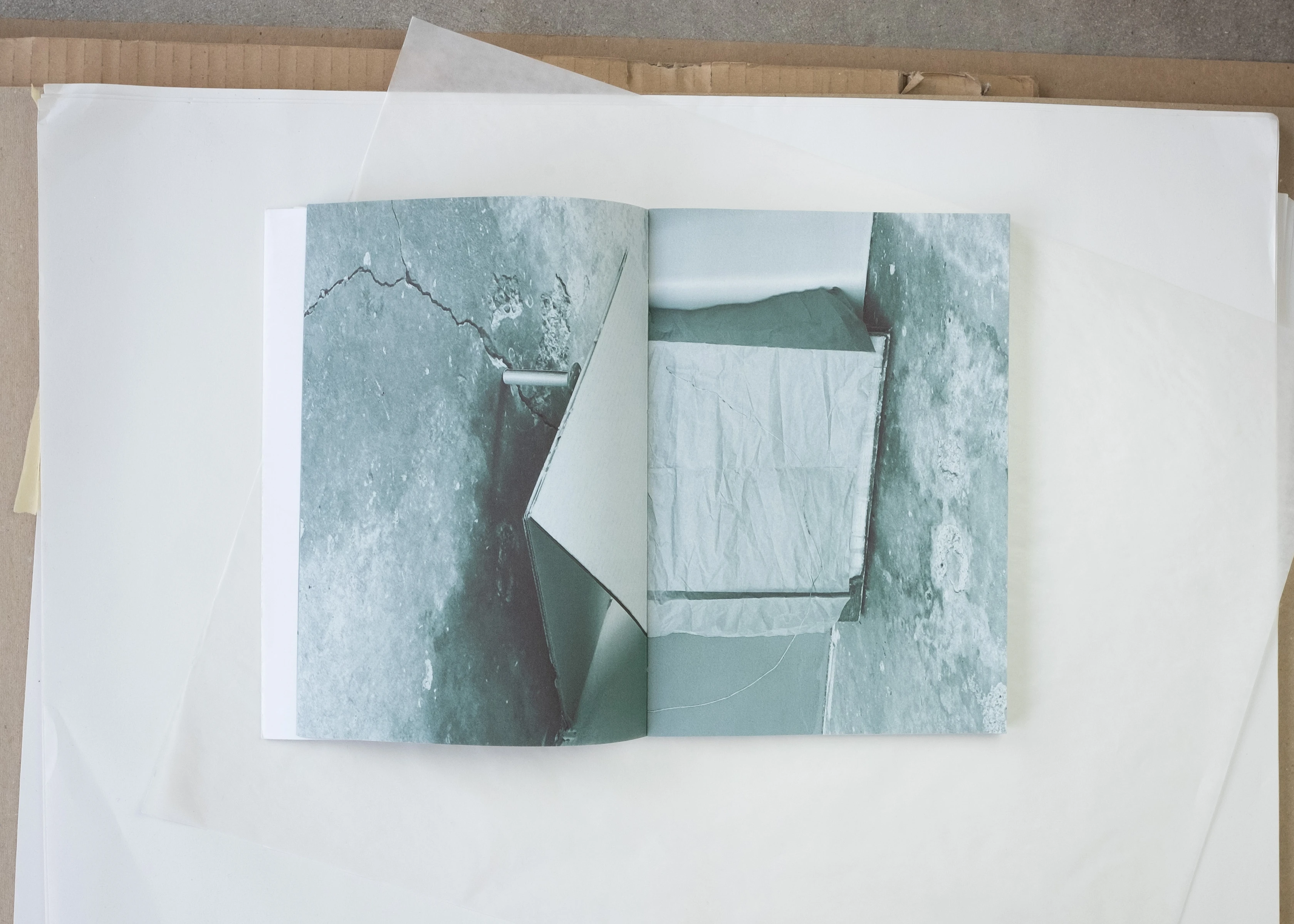 The Source Can Be Transformed (spread), 2024, Inkjet on 7 different types of found paper, 10 x 7 inches