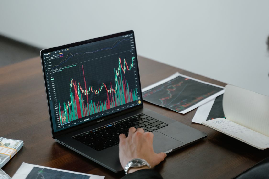 Analytics graph displayed on laptop screen showing conversion data