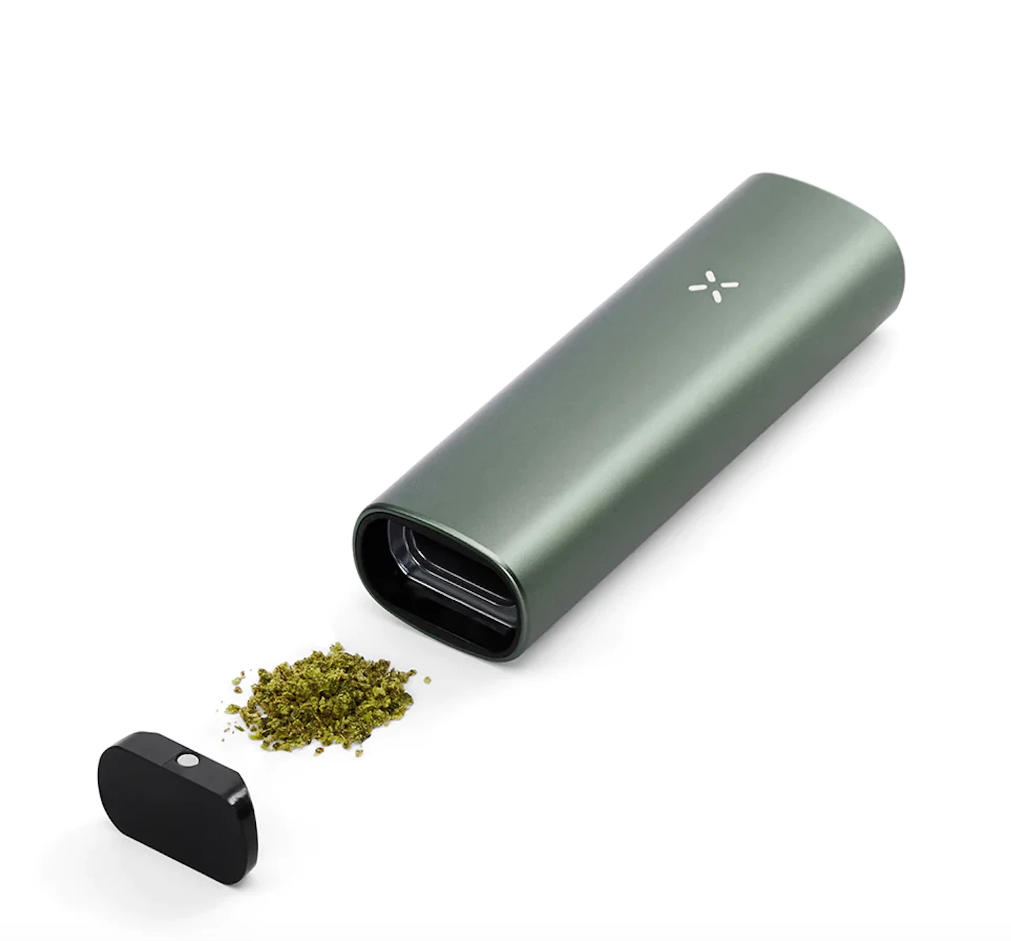 A PAX dried herb vaporizer with the chamber open showcasing the dried, ground cannabis inside of it. 