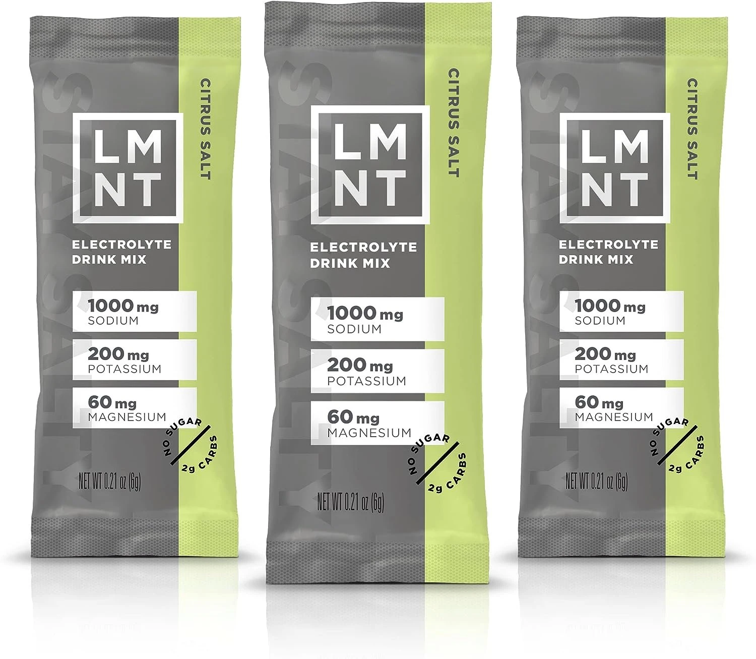 Three packages of green and grey dissolvable LMNT branded electrolytes.