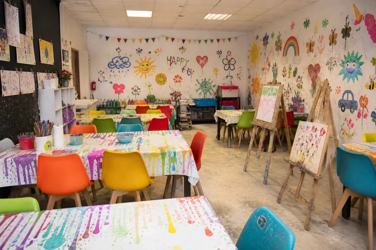 Creative kids birthday space in London with art tables, easels and hands-on making activities | Partyfer