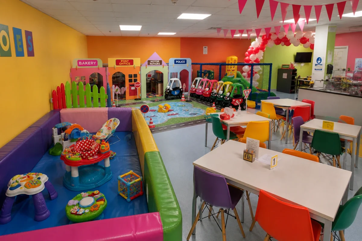 Soft play café with toddler play zones and family seating for a 1st birthday celebration | Partyfer