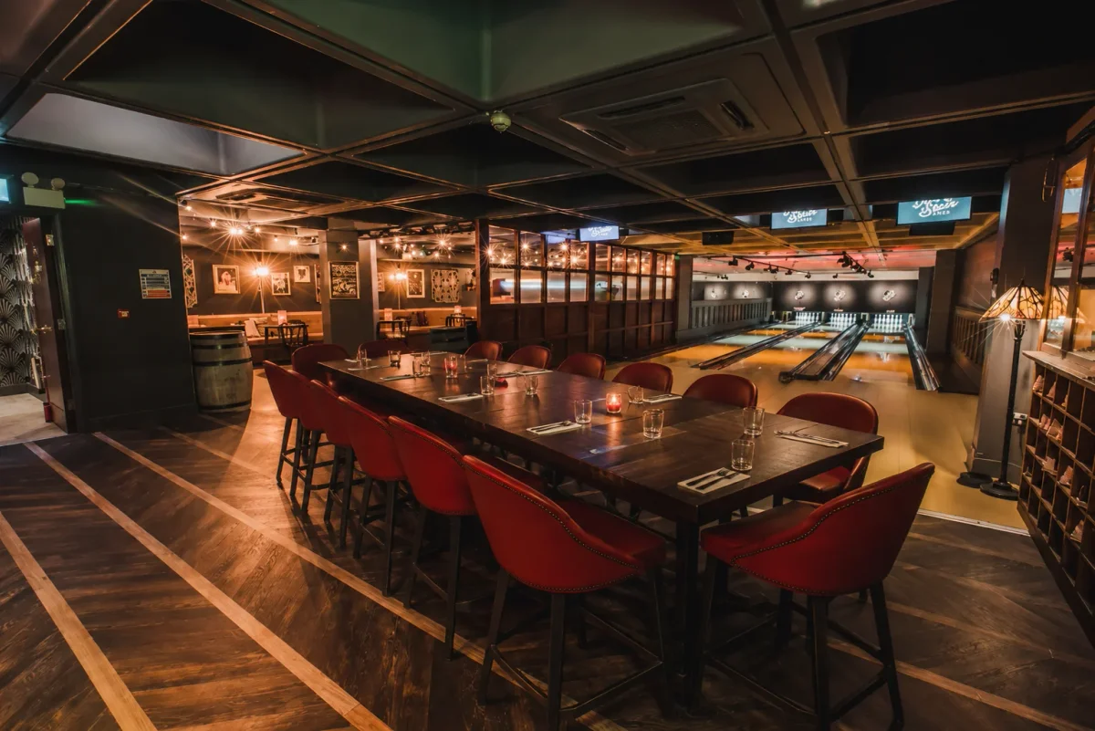 Bowling party venue with group dining table | Partyfer