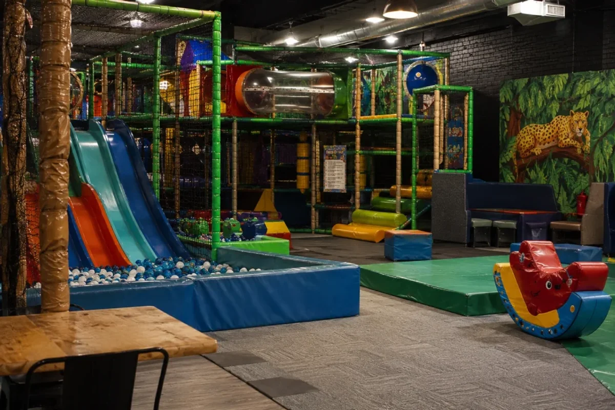 Classic soft play centre with slides, ball pit and climbing frames for an energetic indoor birthday | Partyfer
