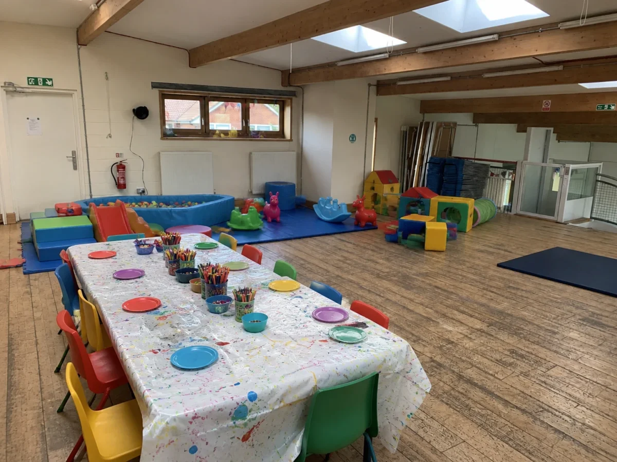 Party hall setup with a temporary soft play zone and a practical children’s party table | Partyfer