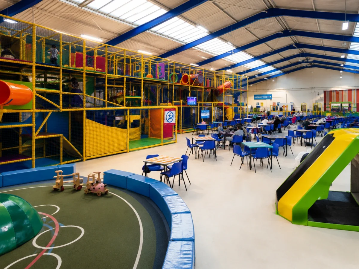 Active indoor birthday venue near Richmond with climbing frames, slides and family seating | Partyfer
