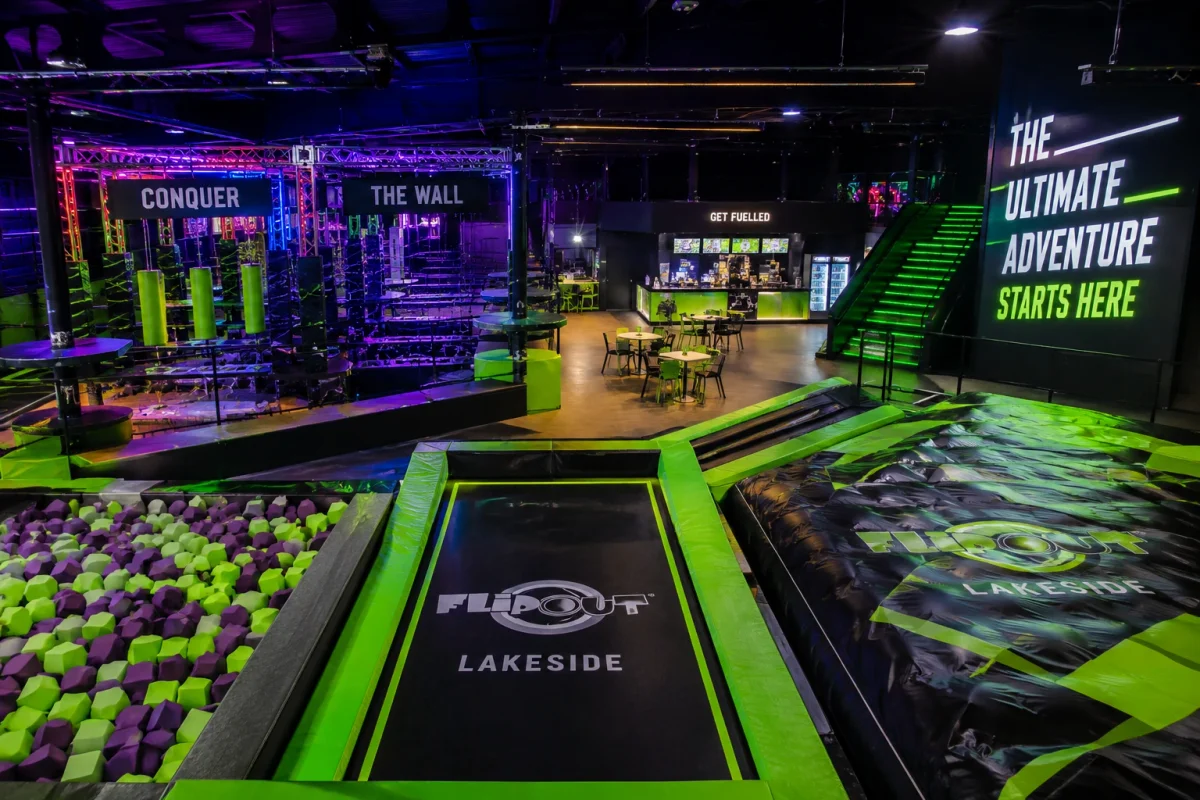 Higher-energy indoor adventure venue near Lakeside with trampolines, obstacle zones and neon lighting | Partyfer