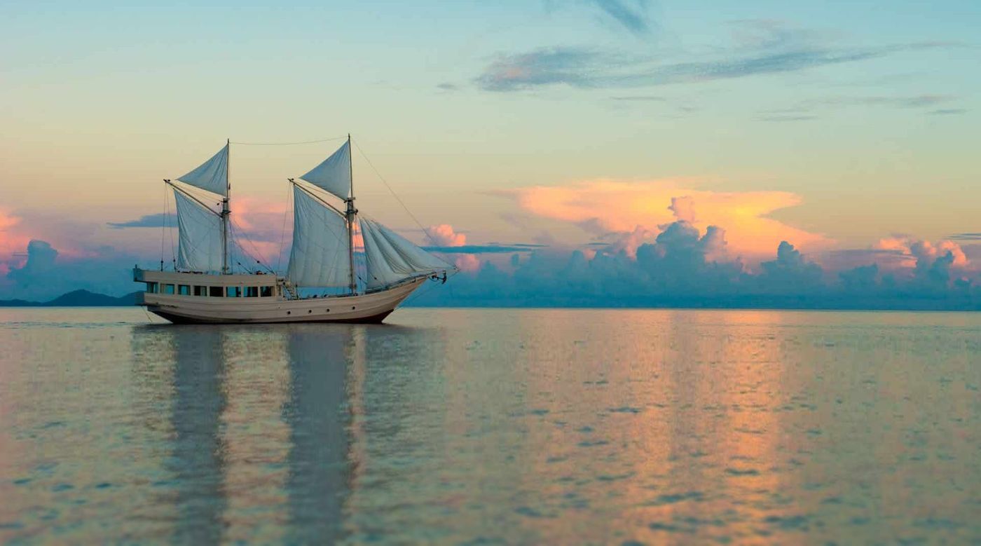 Alexa under sail at sunset