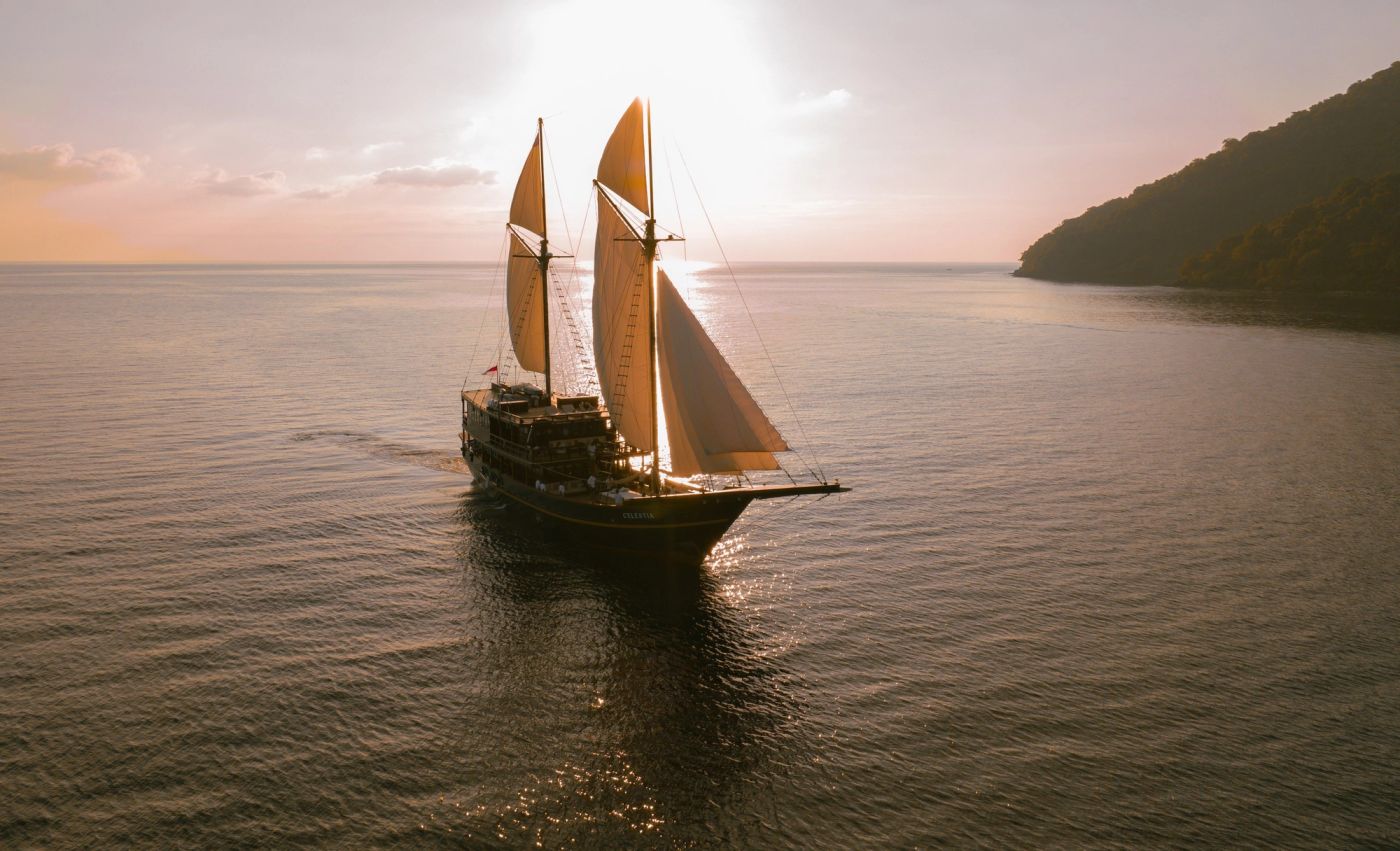 Celestia under golden sails in the evening light