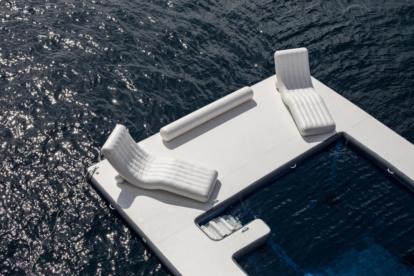 The swim platform puts the reef a single step away.
