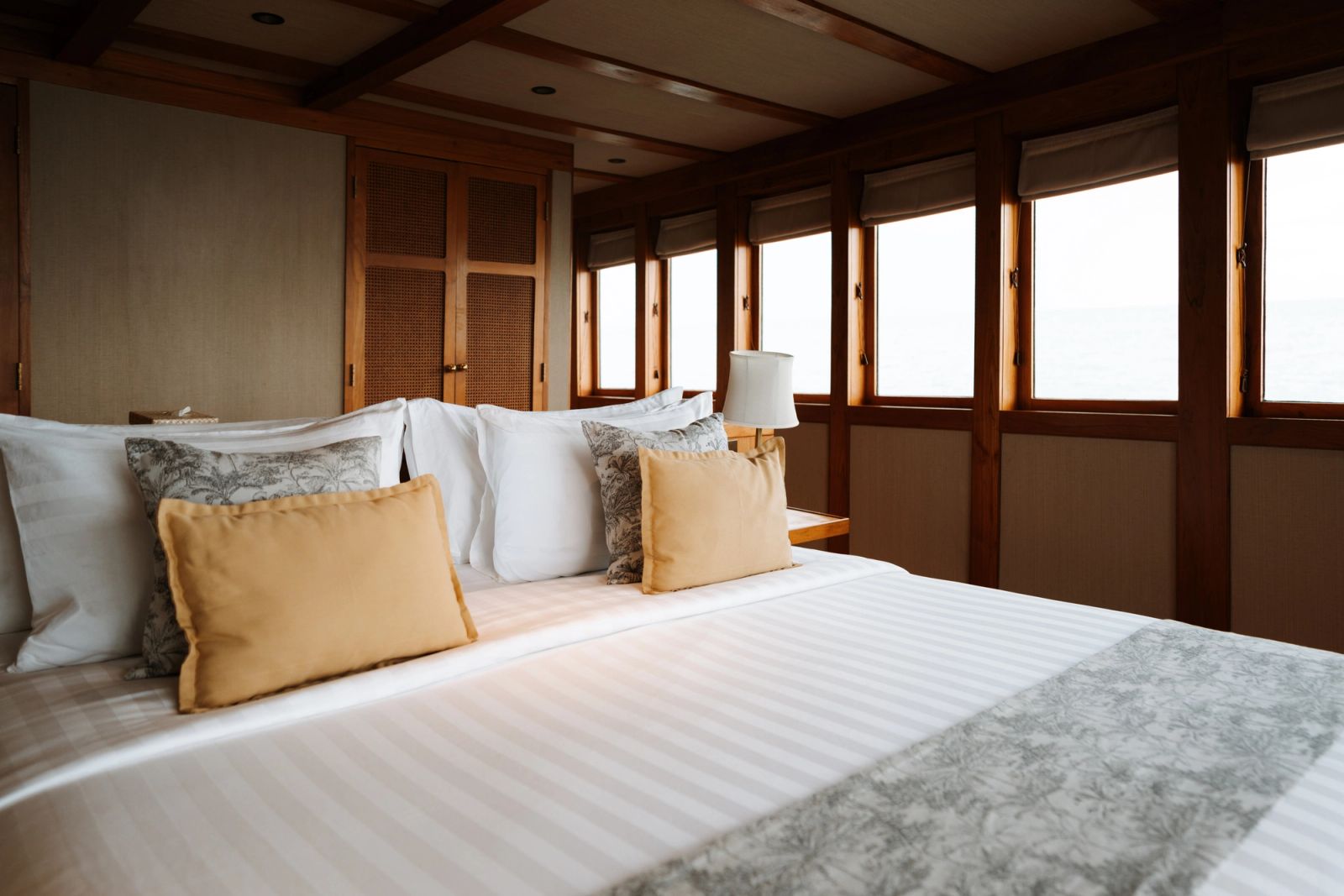 A close view of the king bed in the owner's stateroom on Celestia.