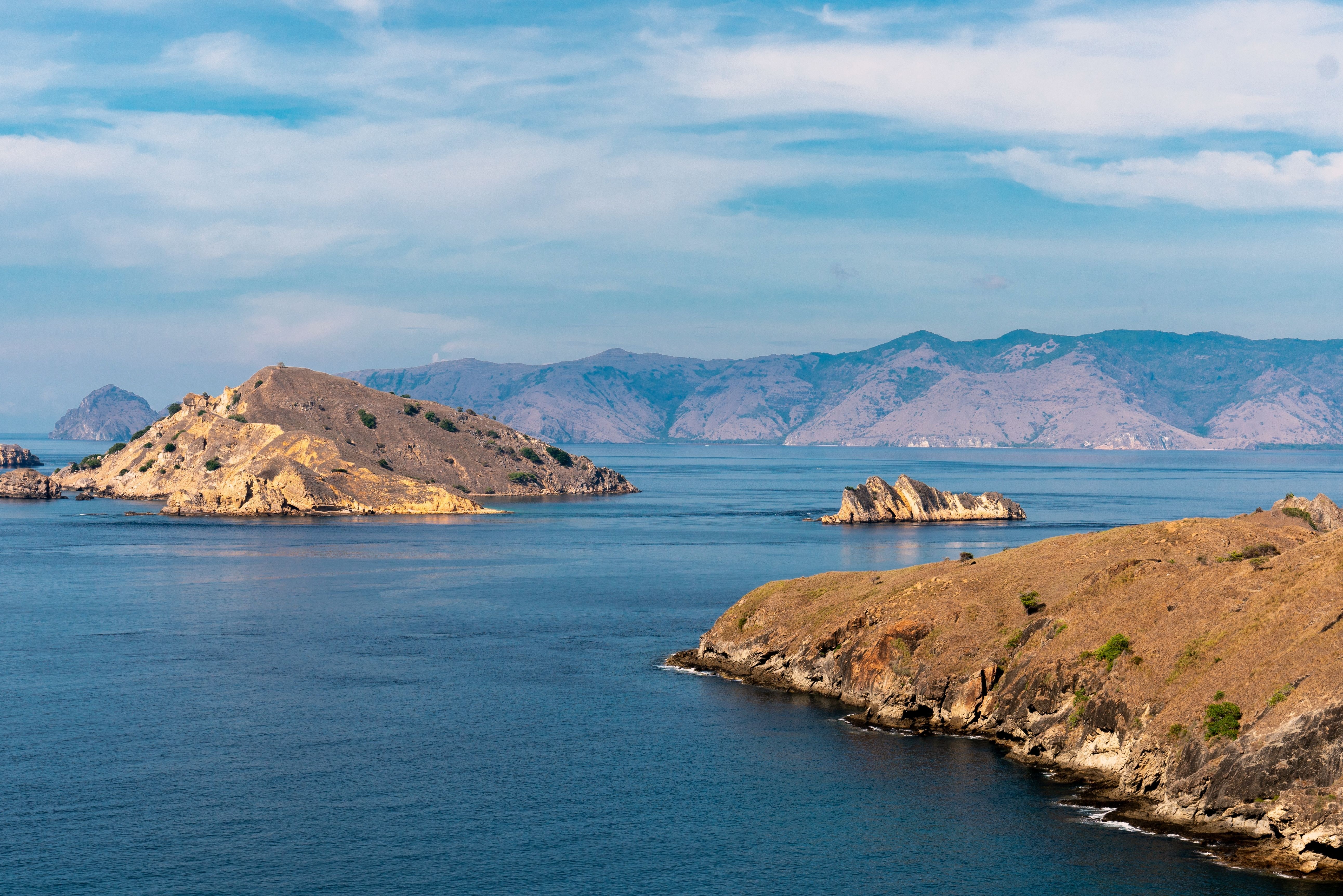 Dry islands and calm water on the approach into Labuan Bajo