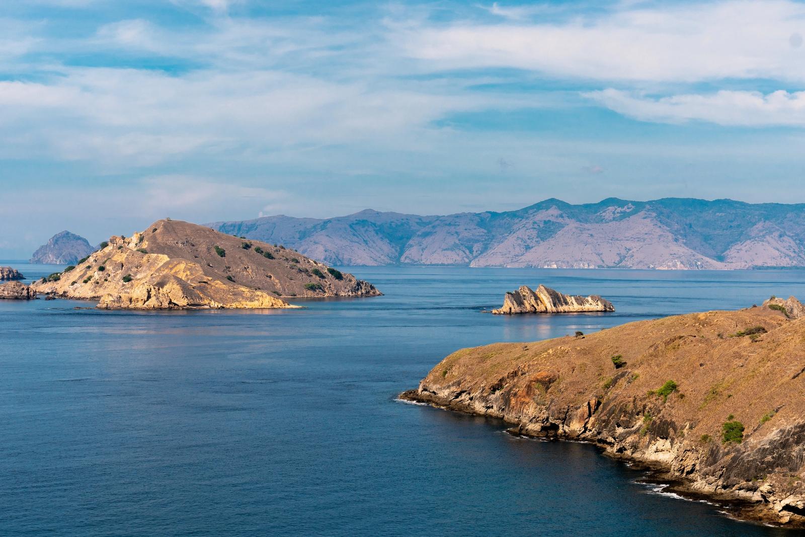 Dry islands and calm water on the approach into Labuan Bajo