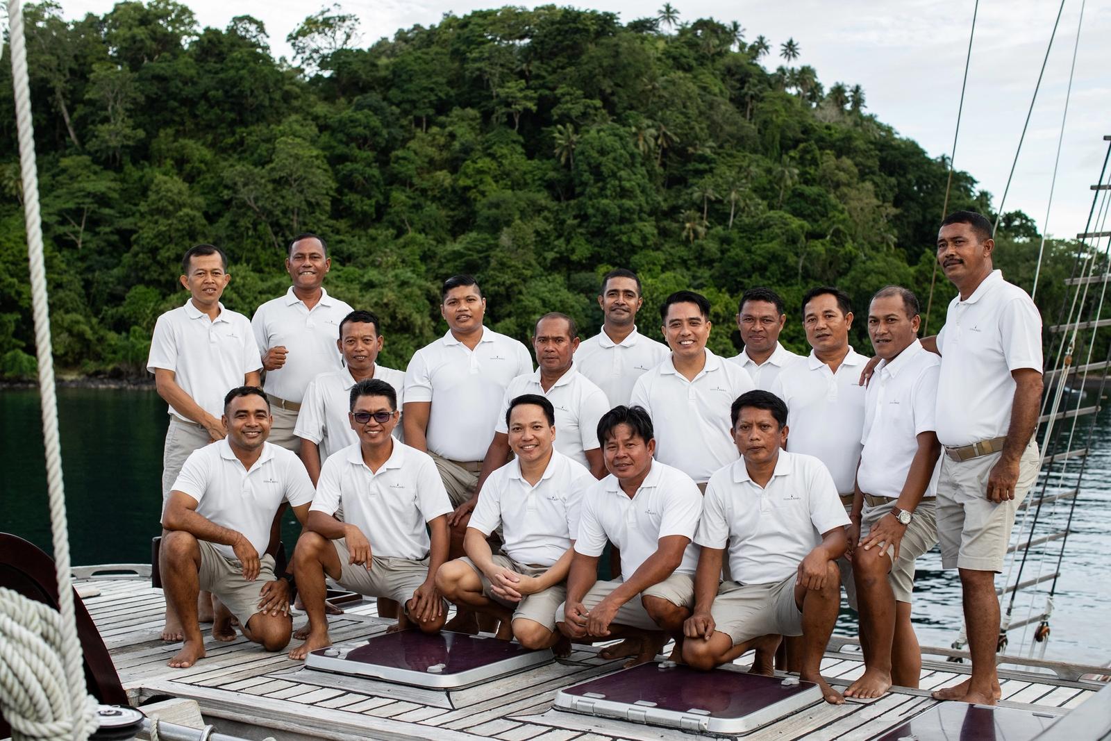 The crew assembled on deck to welcome guests aboard.