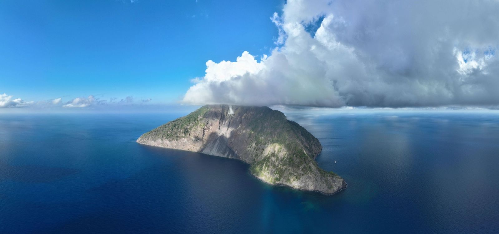 Komba, a remote volcanic island rising from the sea north of Lembata.