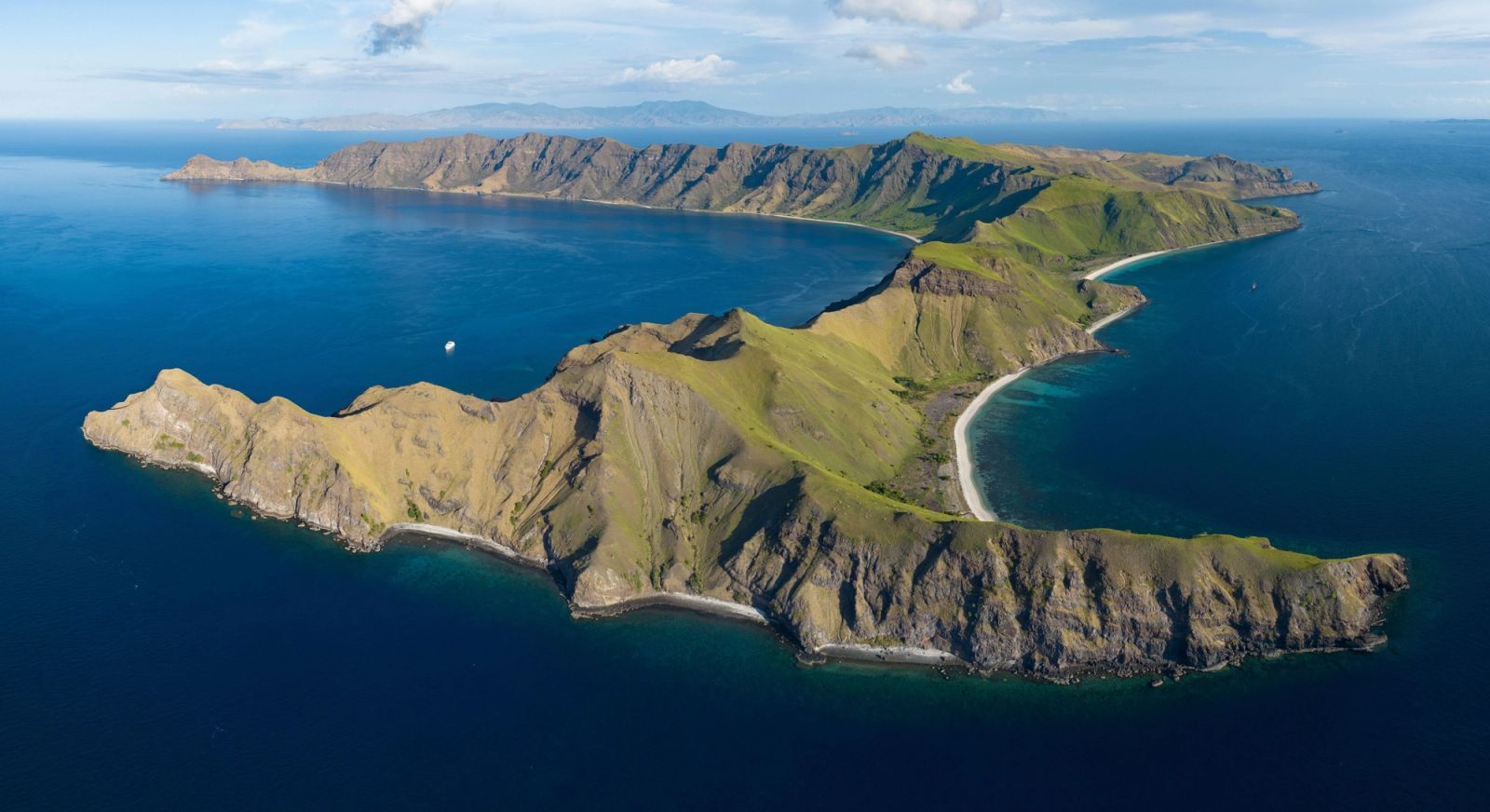 Gili Banta is a beautiful volcanic island, surrounded by healthy coral reefs, located just outside of Komodo National Park, Indonesia