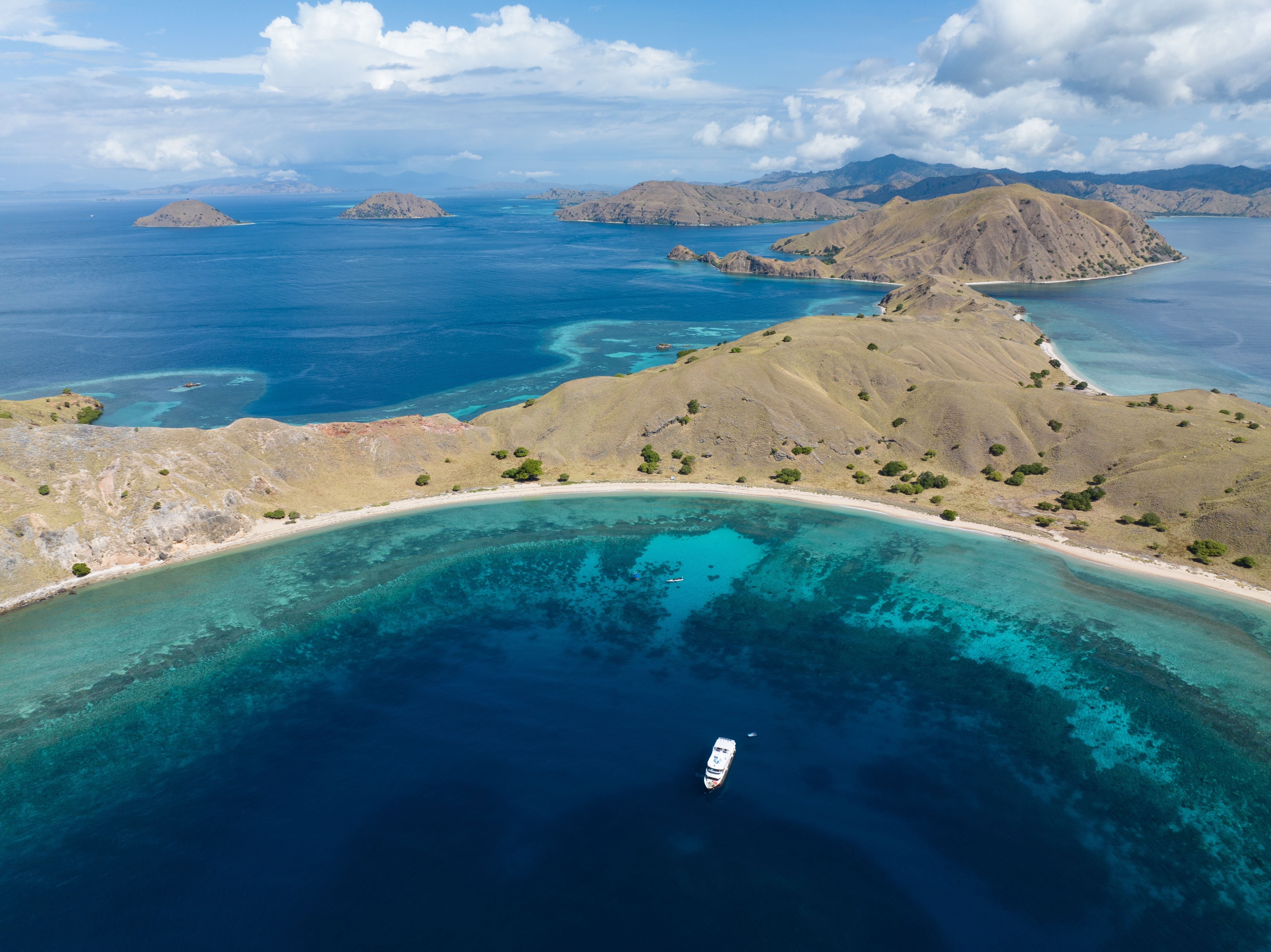 The curving bays and ridges of Padar Island from the air