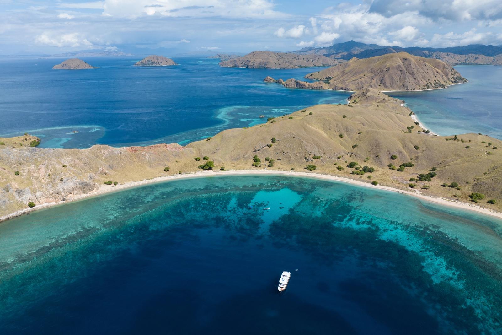The curving bays and ridges of Padar Island from the air