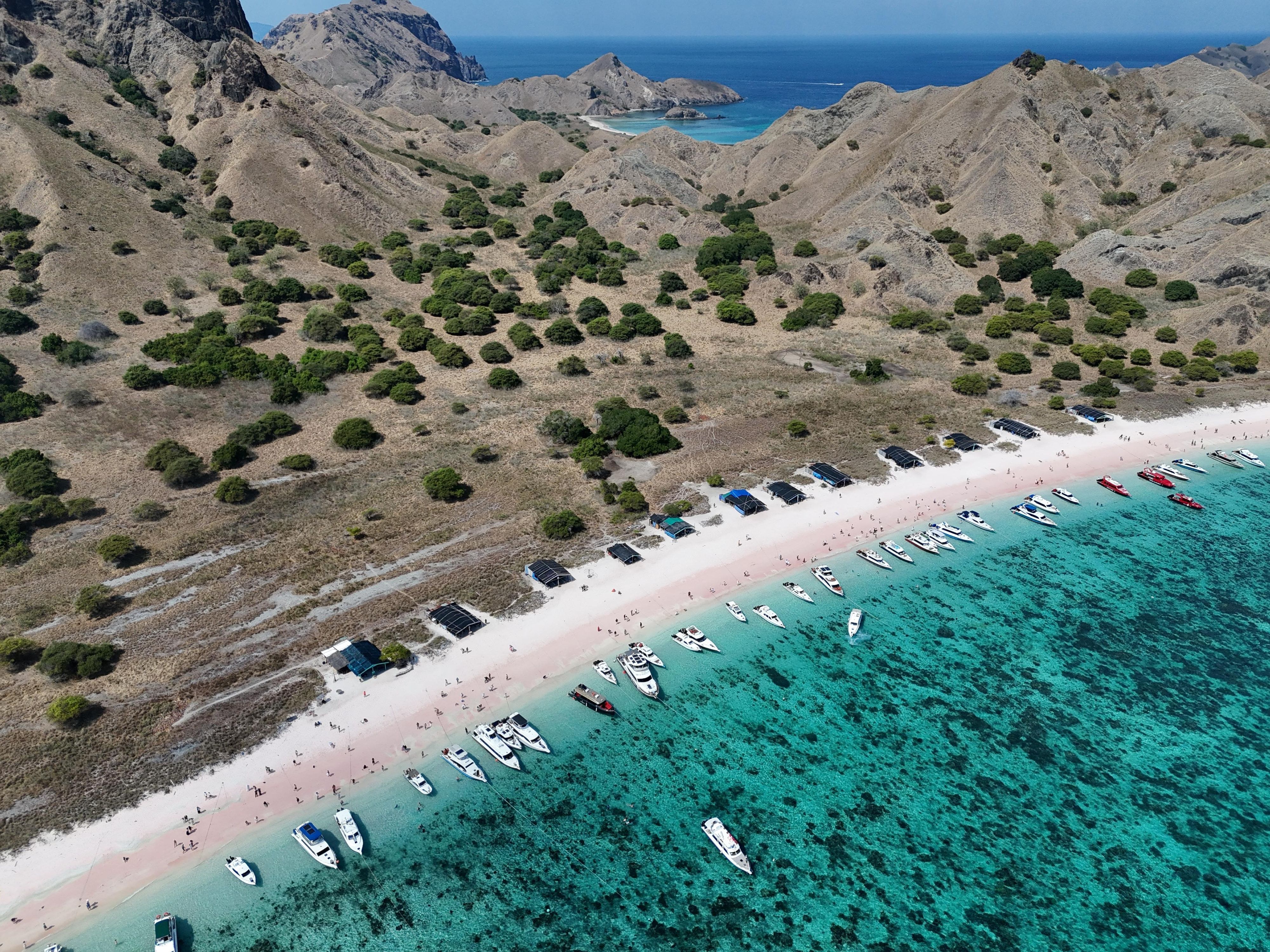 Beautiful Pink Beach with crystal clear turquoise water in Komodo Island, Indonesia.
