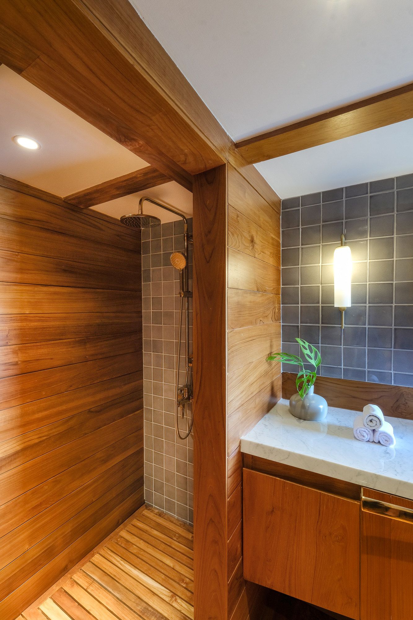The owner's bathroom on Celestia with a vanity and shower.