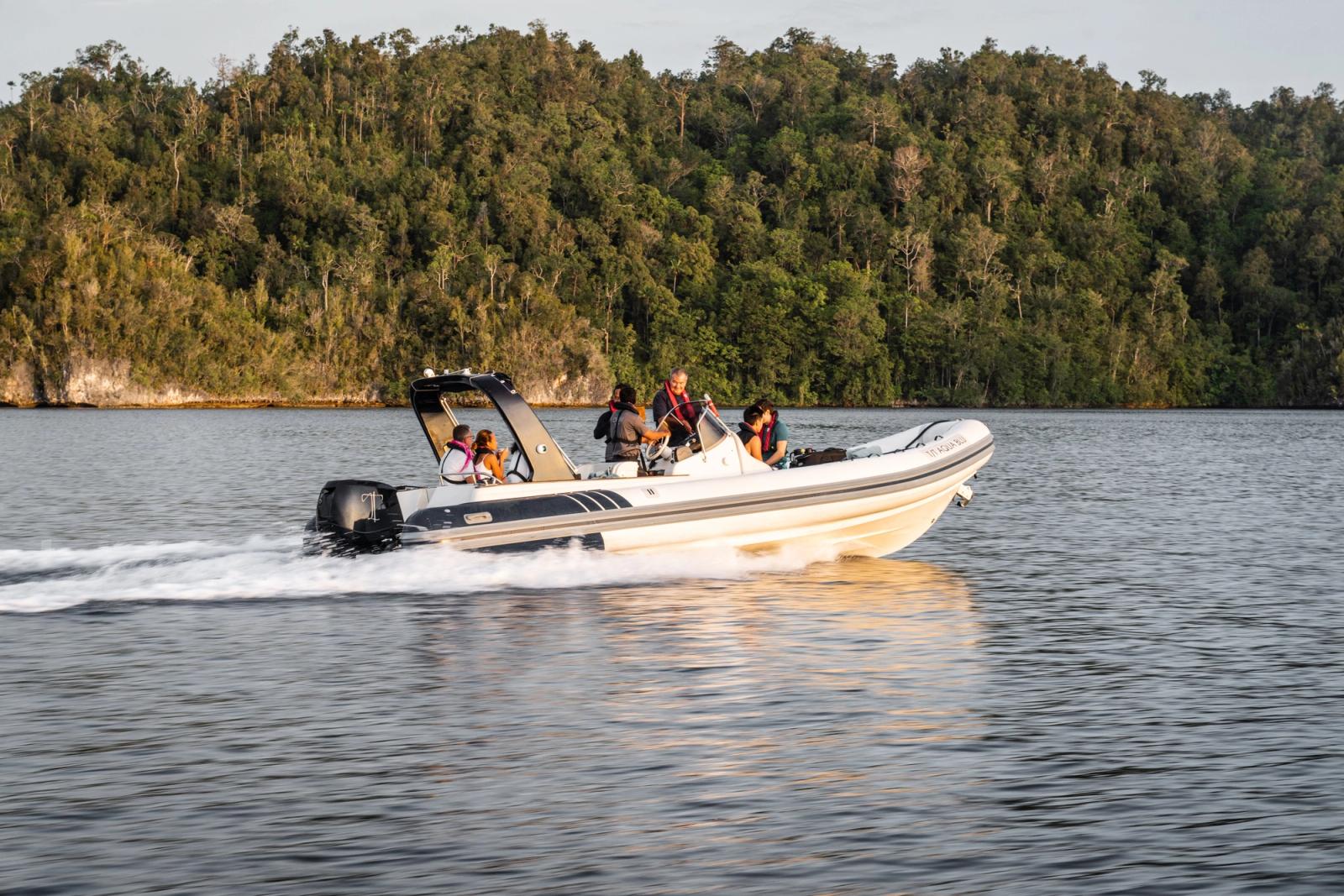 The tender carries divers from the yacht to the first site of the day.