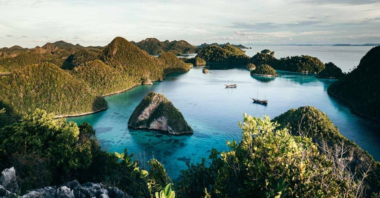 Phinisi at anchor among the Wayag islands of Raja Ampat