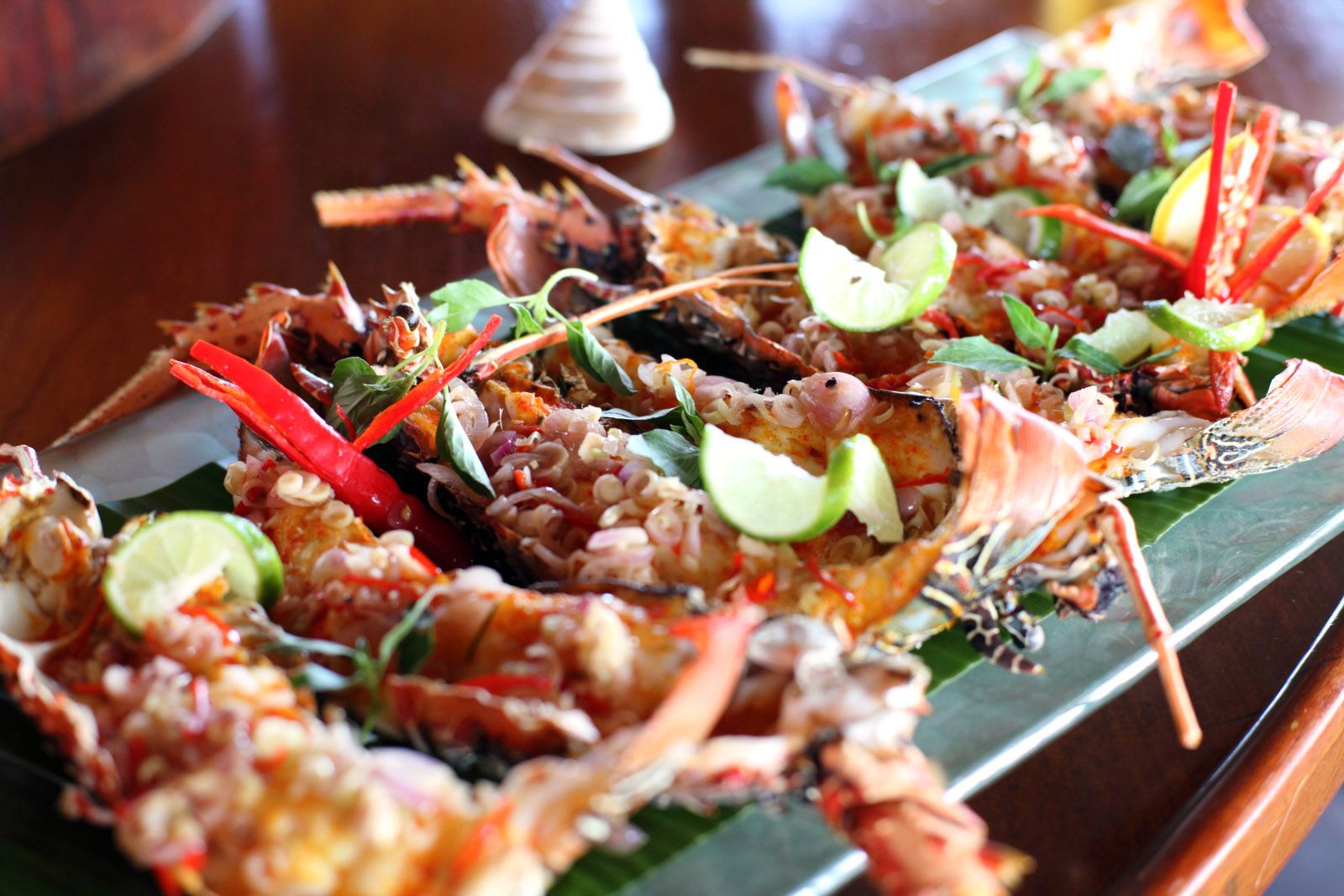 Grilled seafood with chili and lime on a long platter