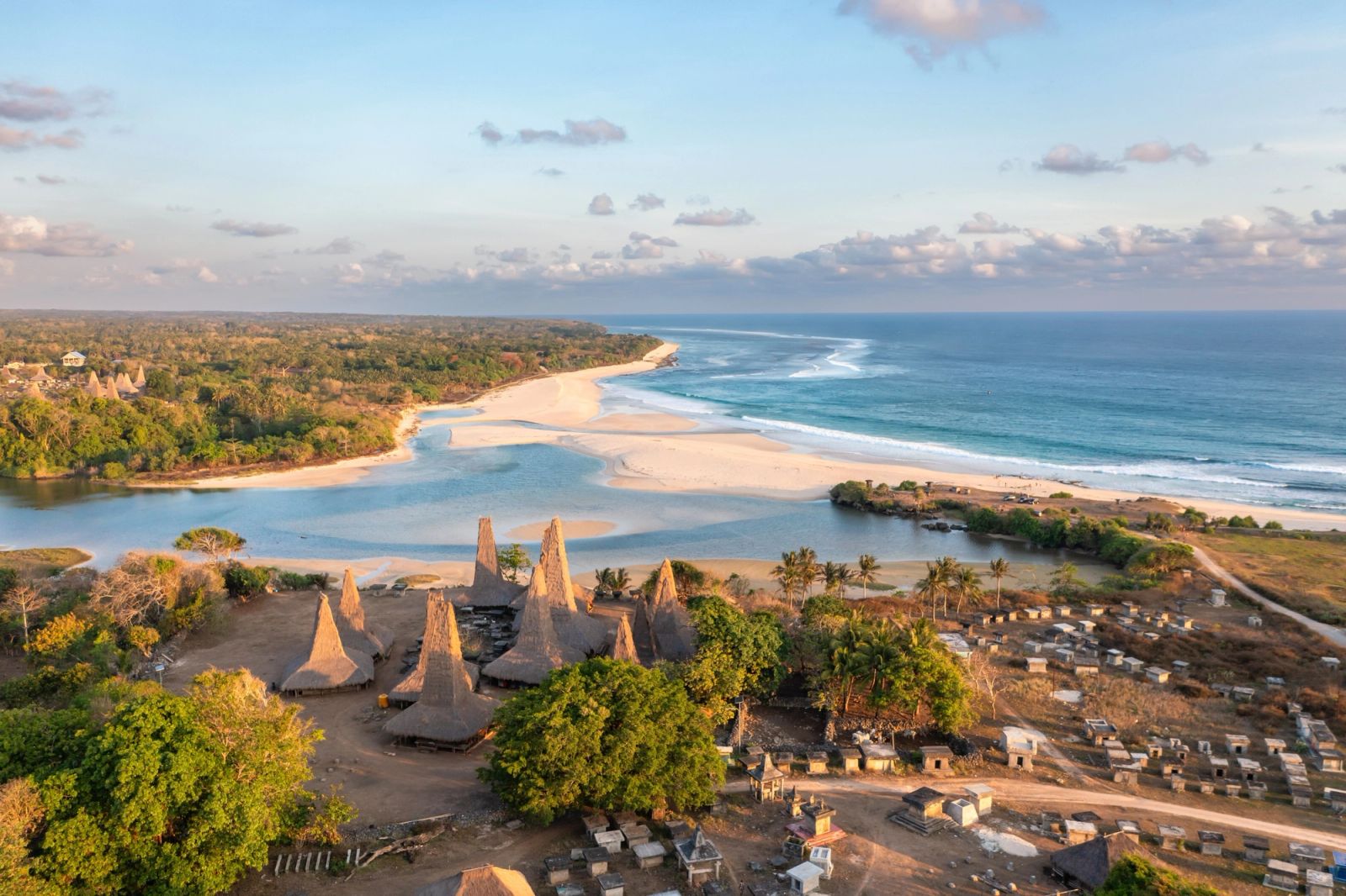 Aerial view of Ratenggaro village and its traditional houses on the west coast of Sumba at sunset