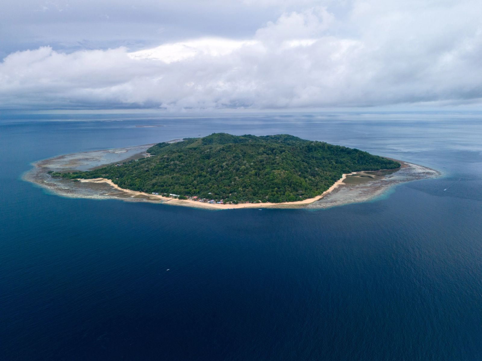 Pulau Hatta and its reef from the air