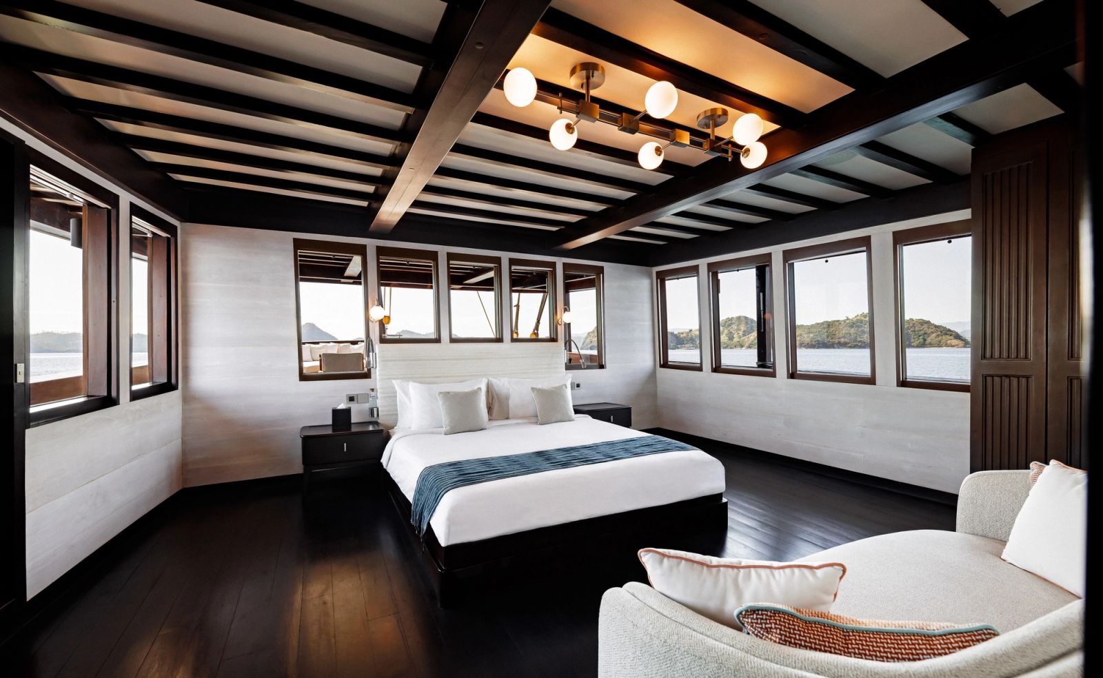 The Owner's Suite aboard Vela with its band of panoramic windows