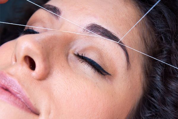 Eyebrow threading