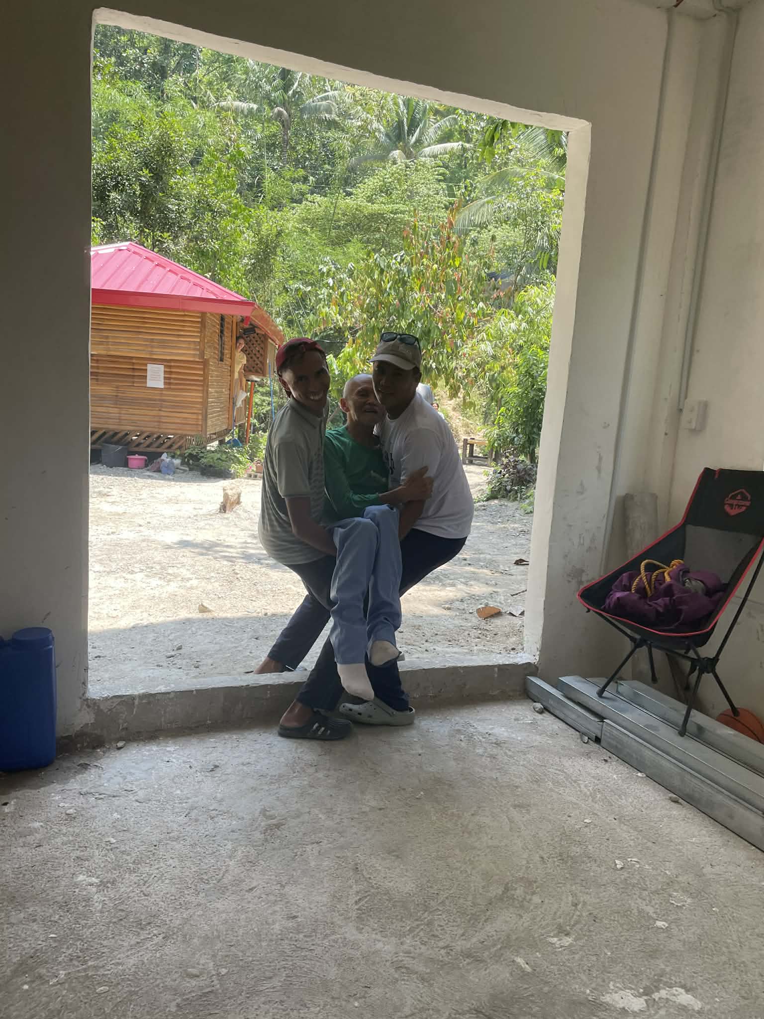 Carrying my grandfather, who had a stroke.