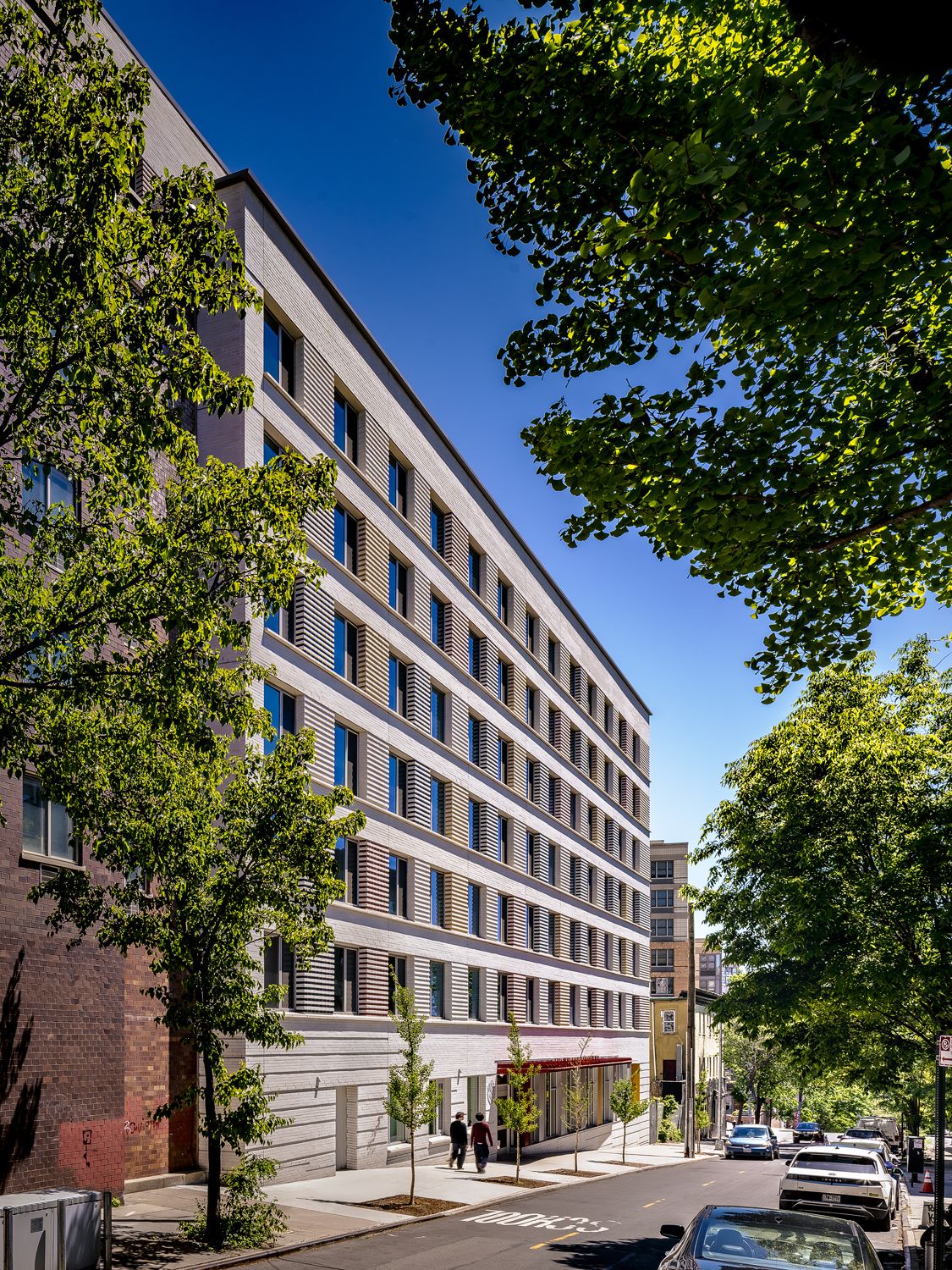 Looking down the hill towards the building's front facade