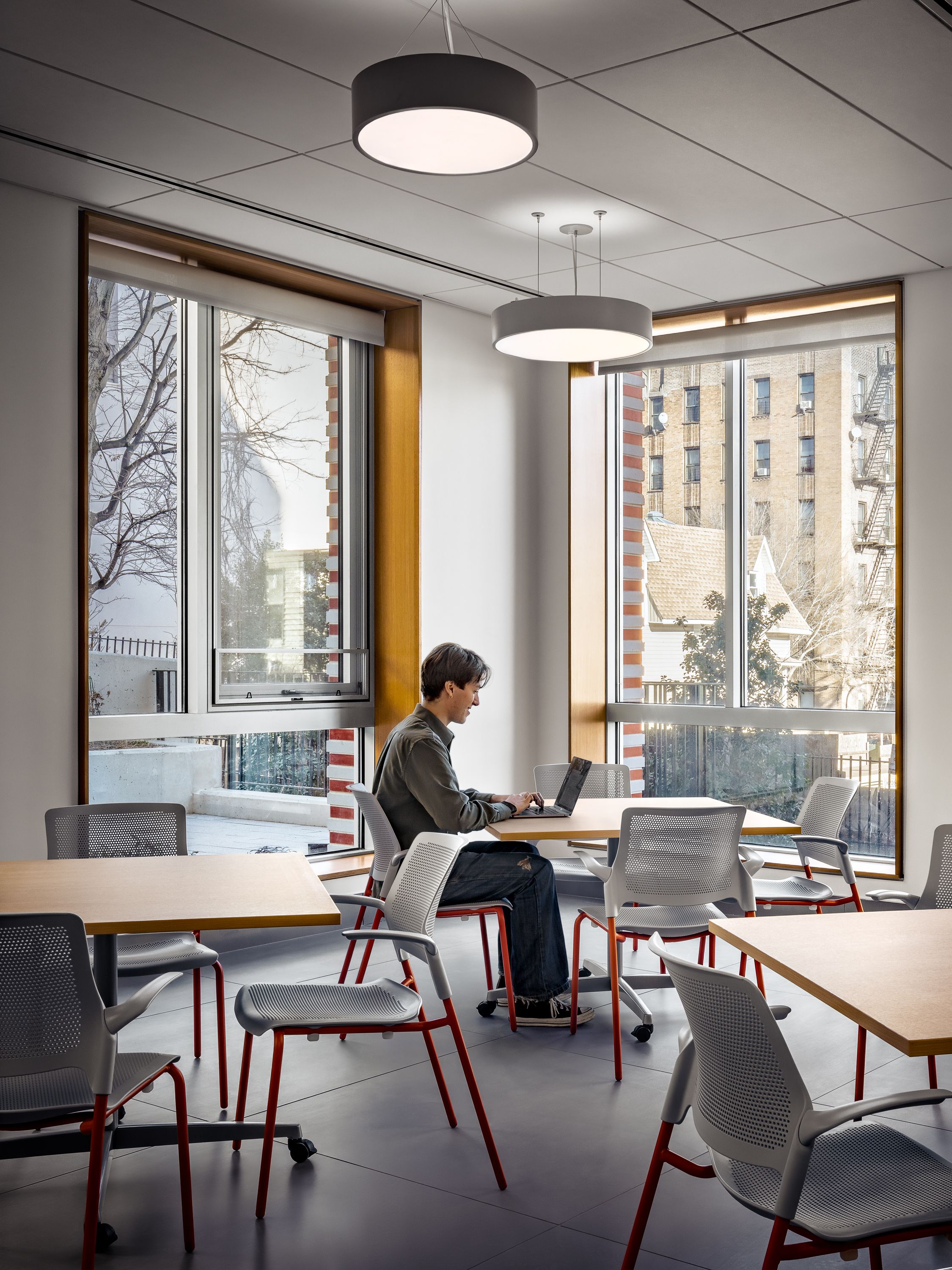 First floor common room with windows towards the back patio