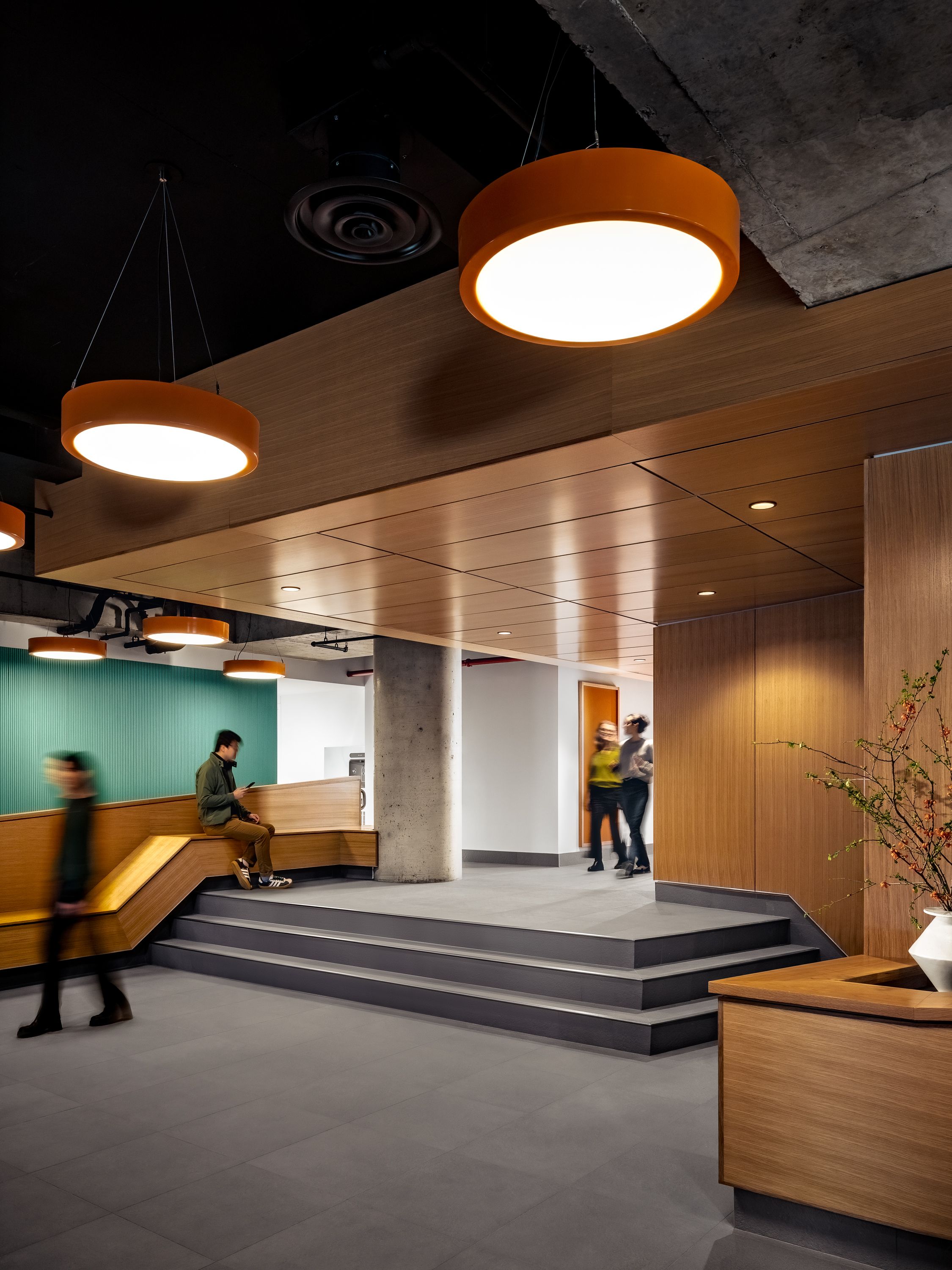 Elegant woodworking throughout the lobby creates a warm, inviting space
