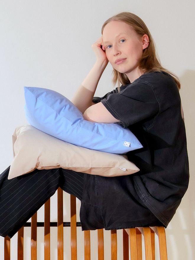 Anu Soiniitty with two of Tenten pillowcases