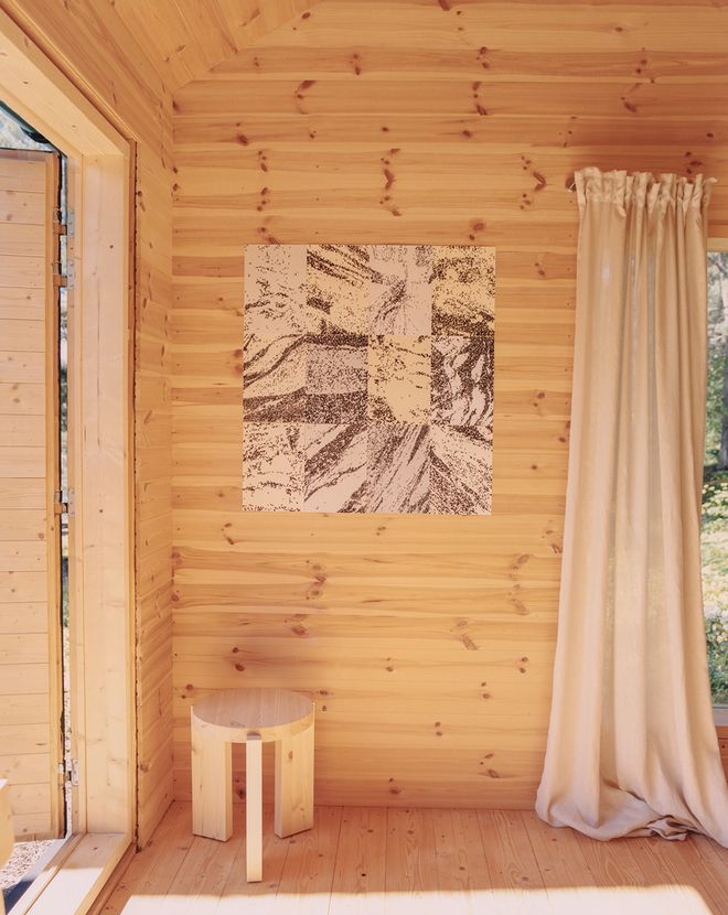 Linn Henrichson's artwork on the studio wall