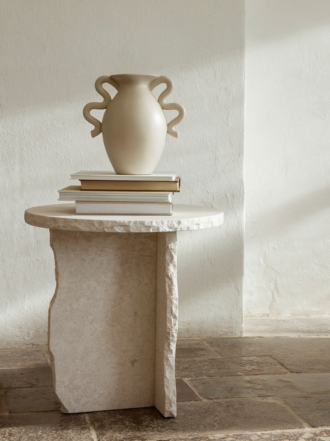 An image of Ferm Living's Verso vase and Mineral Sculptural side table.