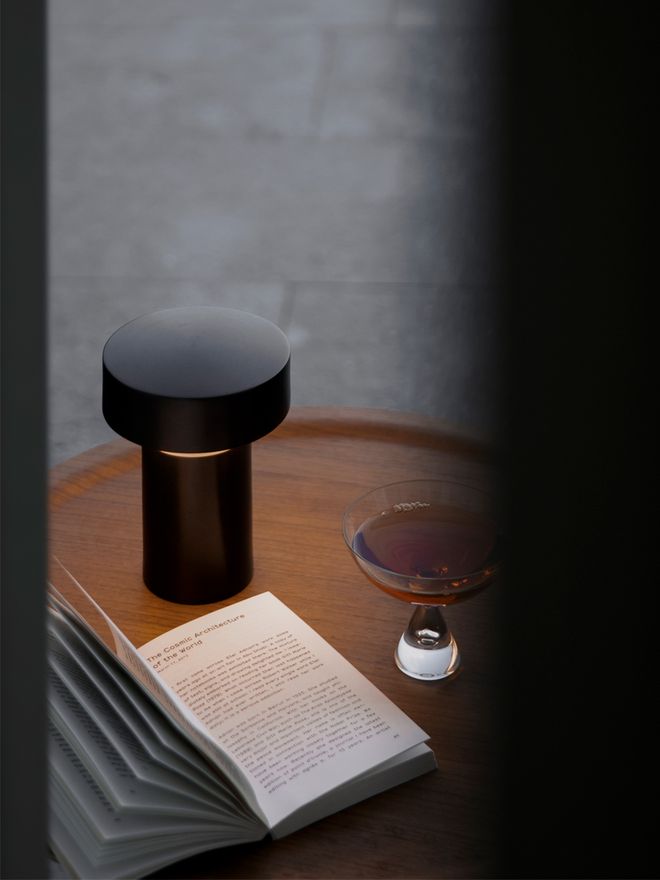 Menu's Column table lamp on a table.