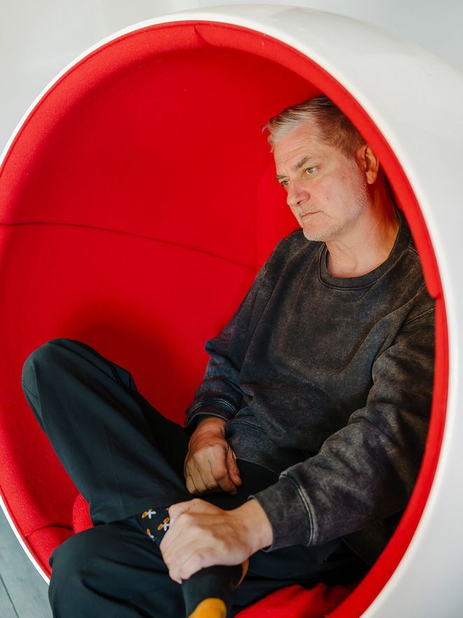 Petteri Masalin sitting in a Ball Chair