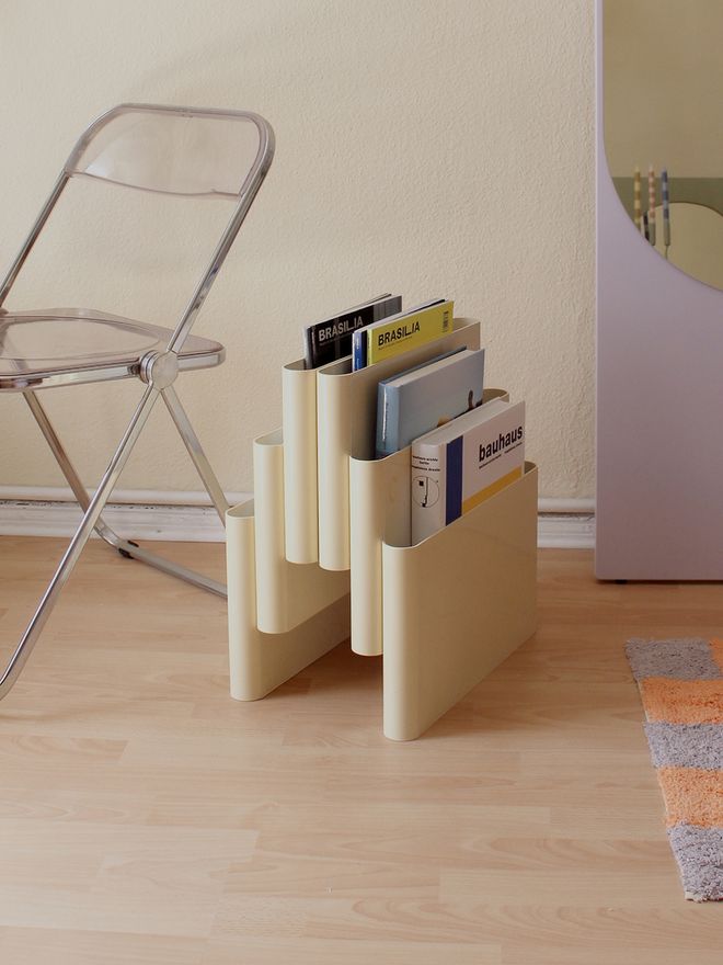 A vintage magazine rack by Giorgio Stoppino for Kartell 