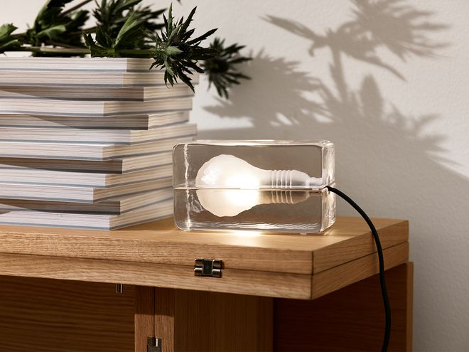 An image featuring Design House Stockholm's Block lamp as part of the living room decor.